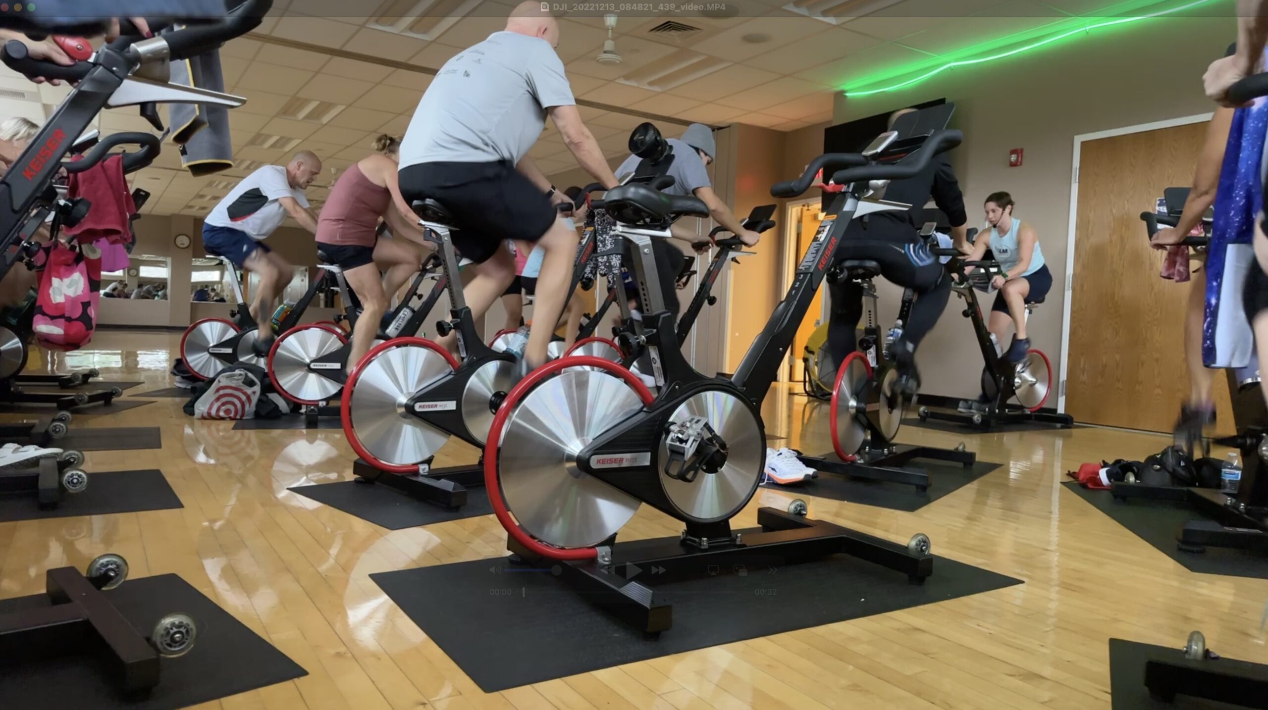 Instructor leading group cycling class